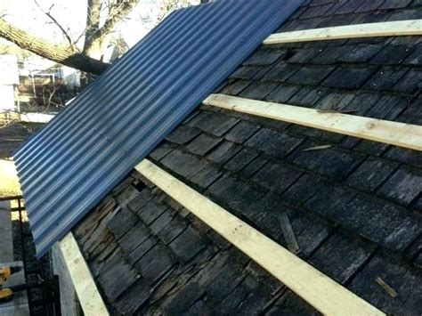 metal roof on house over shingles|how to shingle over existing roof.